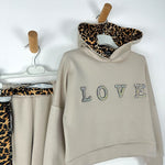 Baby-Trainingsanzug für Mädchen mit Applikationen