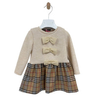 Abitino a maniche lunghe con fiocchetti decorativi